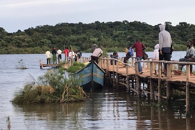 Fishing Village Food Tour & Luwombo Stop - Choosing the fishing dock and processing plant