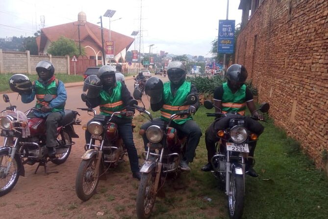 Kampala boda boda tours [motorbike tours]. - Ending at the African Village craft market