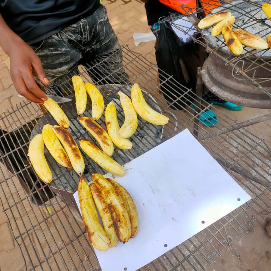 Kampala: Three-Hour Food Tour - The big meal: tilapia, peanut sauce, and banana leaves